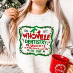 The Grincher Whoville Dentistry Dr. Grinch Sweatshirt | The Grinch Store